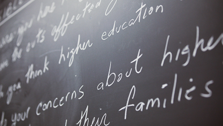 words on chalk board: concerns about higher education